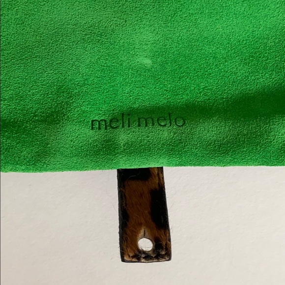 Brand new Meli Melo green suede and leopard clutch